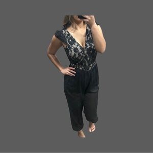Bebe black lace and mesh jumpsuit